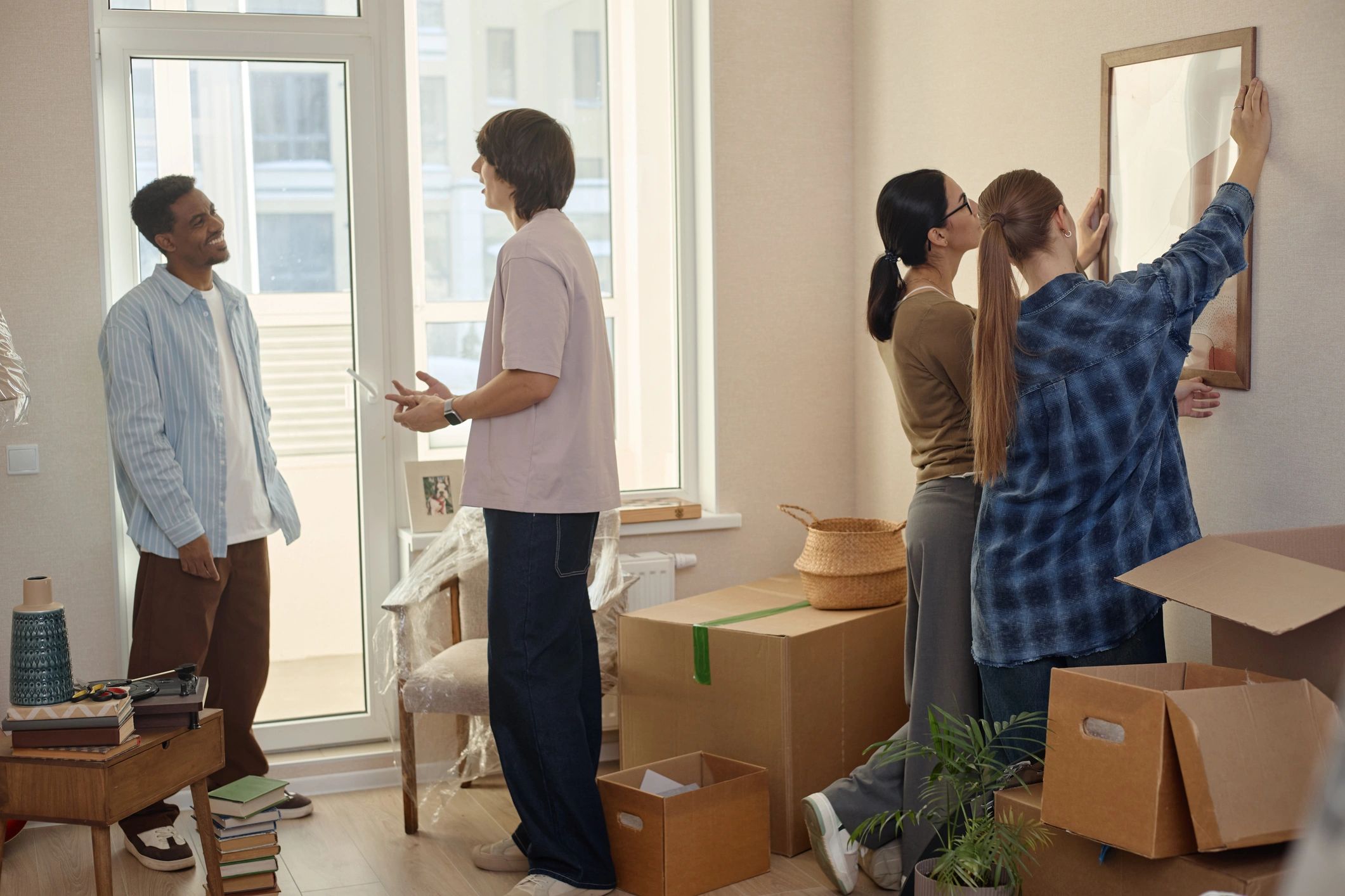 People sorting belongings during a home move